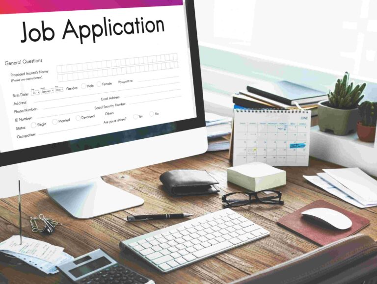 A laptop/compter displaying Job application form, image also consist of a keyboard and a mouse.